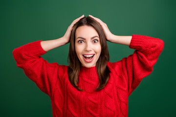 Sticker - Photo portrait girl wearing knitted pullover excited amazed shocked keeping head isolated green color background