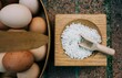 © Cavan Images - salt and fresh mixed eggs in a basket on a brick wall outside