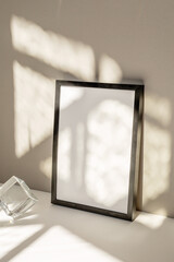black frame mockup sunlight minimal setting