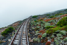 The World's First Mountain-climbing Cog Railway (rack-and-pinion Railway) Leading From The Foothills To The Misty Summit Of Mount Washington, NH, USA