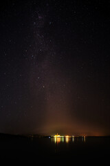 Wall Mural - sky full of stars over a lake