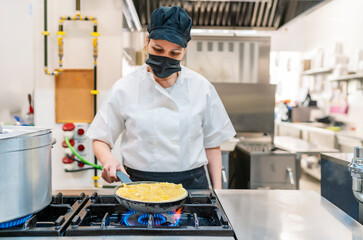 hotel cook preparing the menu