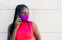 African Woman Athlete Talking From Her Smartphone