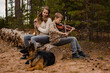© Cavan Images - Family duet brother and sister, boy and girl, teenagers play trumpet a