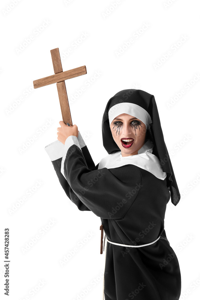 Woman dressed for Halloween as nun on white background