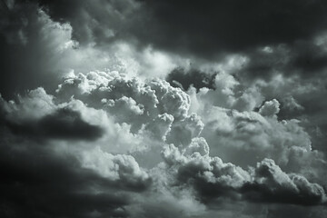 Wall Mural - gray stormy cumulus clouds. gloomy cloudy sky background with copy space for design. dramatic clouds