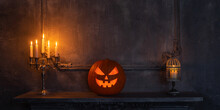Scary Laughing Pumpkin And Old Skull On Ancient Gothic Fireplace. Halloween, Witchcraft And Magic.