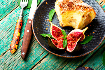 Poster - Autumn pie with figs,wooden background