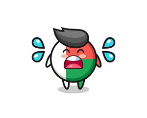 Sticker - madagascar flag badge cartoon illustration with crying gesture