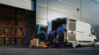 © Gorodenkoff - Outside of Logistics Distributions Warehouse With Manager Using Tablet Computer, Workers Start Loading Delivery Truck with Cardboard Boxes. Online Orders, Purchases, E-Commerce Goods.