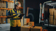 © Gorodenkoff - Outside of Logistics Retail Warehouse: Handsome Latin Manager Using Tablet Computer for Inventory. Delivery Service with Cardboard Boxes, Online Orders, E-Commerce. Evening Shot