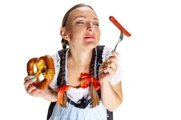 Close-up happy Oktoberfest woman, waitress wearing a traditional Bavarian or german dirndl isolated on white studio background.