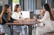 © EduLife Photos - Young Asian college students have meetings with a teacher advisor or a tutor to discuss the project