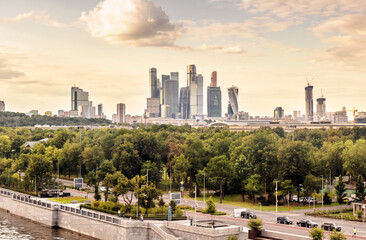 Wall Mural - Moscow in summer, Russia. Scenic panorama of Luzhniki Park and Moscow-City in distance.