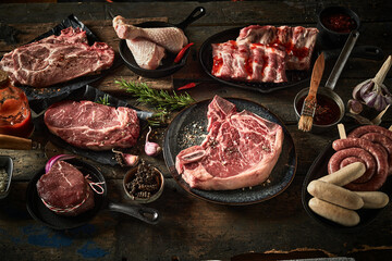 Wall Mural - Various fresh meat on wooden table