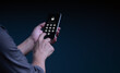 © U-STUDIOGRAPHY DD59  - Businessman with a mobile phone is secure in his account. The concept is hacking a Phishing mobile phone with a password to access a smartphone, security threats online, and fraud.