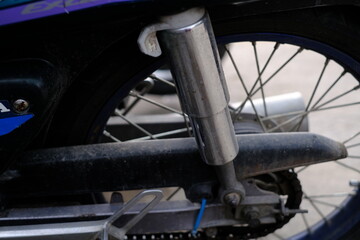 Wall Mural - Close-up of the motorcycle rear shock cylinder.