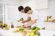 © Blanscape - Asian gay couple make sandwich in kitchen