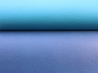 Wall Mural - blue-gray graphic resource bisected by a shaded line, paper texture of two sheets tucked in a wave, two-tone paper background of cold shades, blank backdrop of even colored material