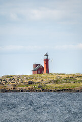 Wall Mural - The Island Of Tylon is a nature reserve since 1927 and has it’s own lighthouse. It is located close to Tylosand, Halmstad, Sweden. Selective focus.