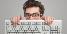 Funny Geek Man With Keyboard