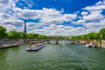 Fototapete - View of Eiffel tower and Seine river in Paris, France. Eiffel Tower is one of the most iconic landmarks of Paris. Cityscape of Paris