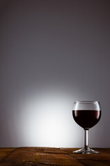 Poster - Vertical shot of a glass of red wine