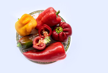 Canvas Print - Plate of bell peppers on a white background