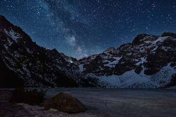 Wall Mural - bright starry sky with the milky way on the background of high tatras mountains