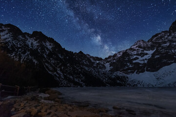 Wall Mural - bright starry sky with the milky way on the background of high tatras mountains