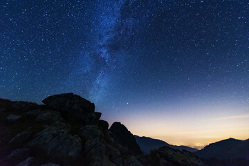 Wall Mural - bright starry sky with the milky way on the background of high tatras mountains