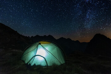 Wall Mural - bright starry sky with the milky way on the background of high tatras mountains