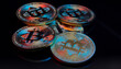 © RccBtn - Bitcoin Münzen vor einem dunklen Hintergrund mit Spiegelungen