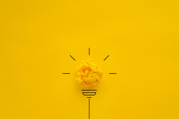 light bulb over yellow background in vision and idea conceptual image
