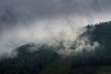 Fototapeta Na ścianę - Epic Mountain Clouds Mist in Austria at Sunset Sunrise