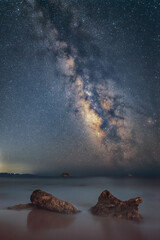Wall Mural - Milky way galaxy above Zakynthos island captured from Kefalonia island, Greece. The night sky is astronomical accurate.
