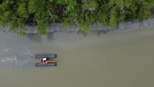 Top Down View Towable Backhoe River Swamp Buggy Amphibious Excavator Move At River Near Mangrove Forest