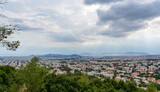 Fototapeta Do pokoju - Panoramic view of cloudy Athens, taken shot from Penteli mountain.