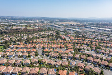 Wall Mural - Aerial view of rows of homes in a suburban master planned community