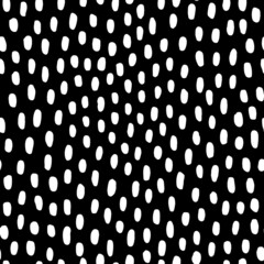 Wall Mural - Polka dot seamless pattern. Hand drawn texture for print, textile, packaging. White dots on black background