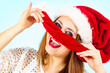 Happy woman in christmas santa hat