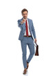 © Viorel Sima - happy young businessman holding suitcase and pointing finger