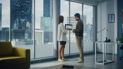 Poster - Successful Corporate CEO and Investment Manager Talk, Use Laptop Computer, Standing in Big City Office. Two Successful Diverse People Discuss Data Analysis of e-Commerce Software Statistics, Growth