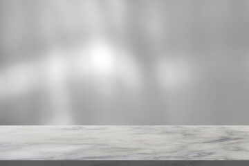 Wall Mural - Marble table with window shadow drop on white wall background for mockup product display