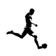 Soccer player running and kicking ball, isolated vector silhouette, side view. Footballer ink drawing, striker