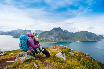family travel mother and son baby hiking in mountains together summer vacations adventure healthy li