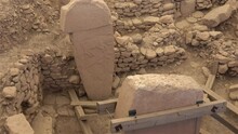 Gobeklitepe, Sanliurfa, Turkey - 15th Of June 2021: 4K Zoom In Animals Reliefs On Stone Pillar
