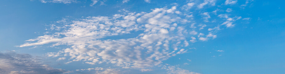 Wall Mural - Panorama of blue sky with white air clouds. Banner.