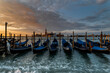 Gondolas on the lagoon at Sunrise, Venice, Italy