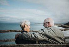 Senior Couple Enjoying The View Of The Ocean